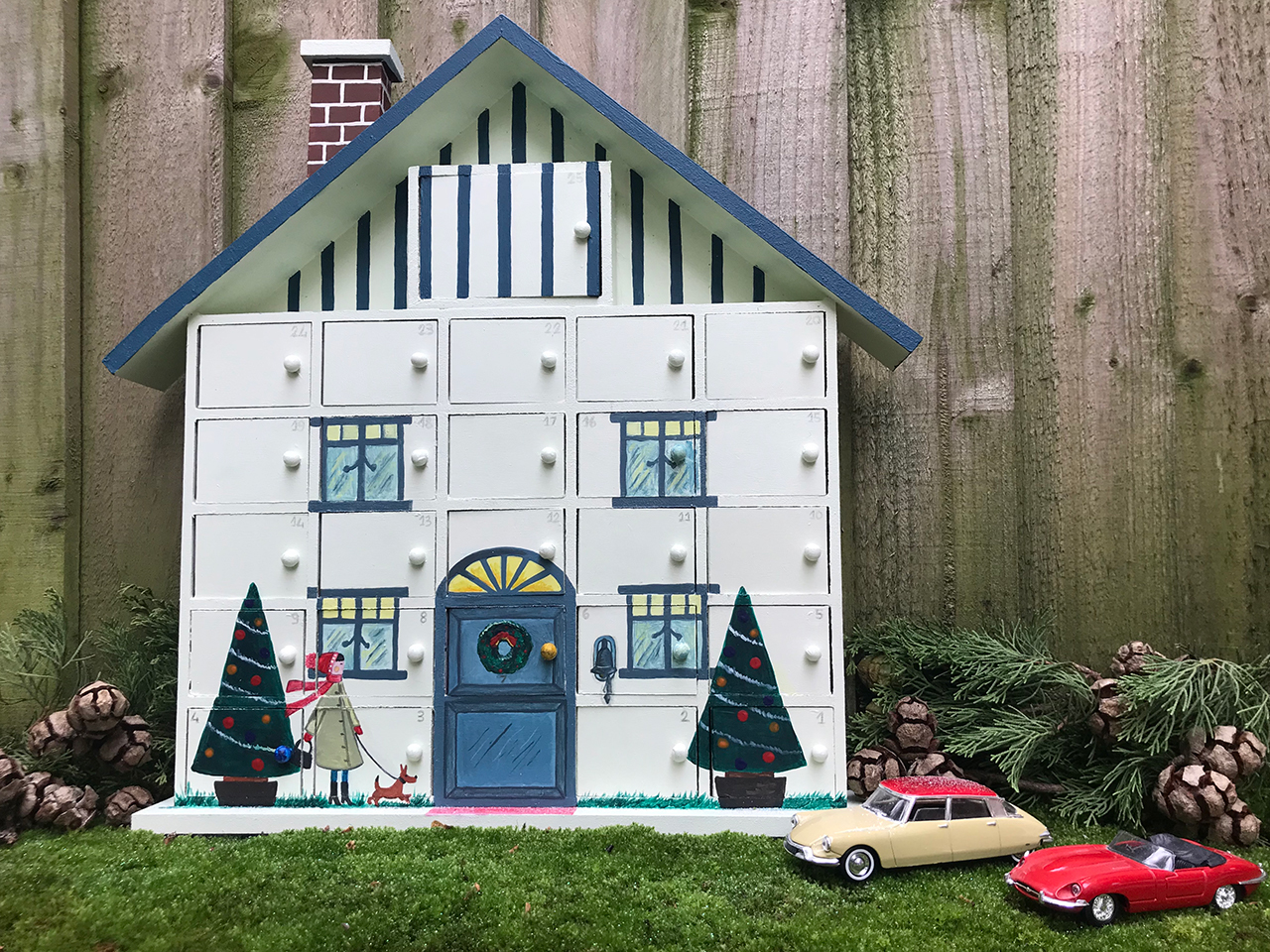 My painted wooden advent house calendar