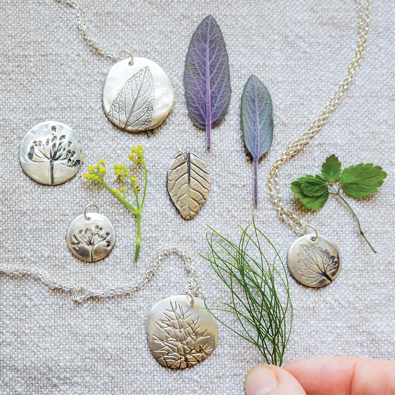 Silver Fossil Pendants from 'Making Winter' by Emma Mitchell.
